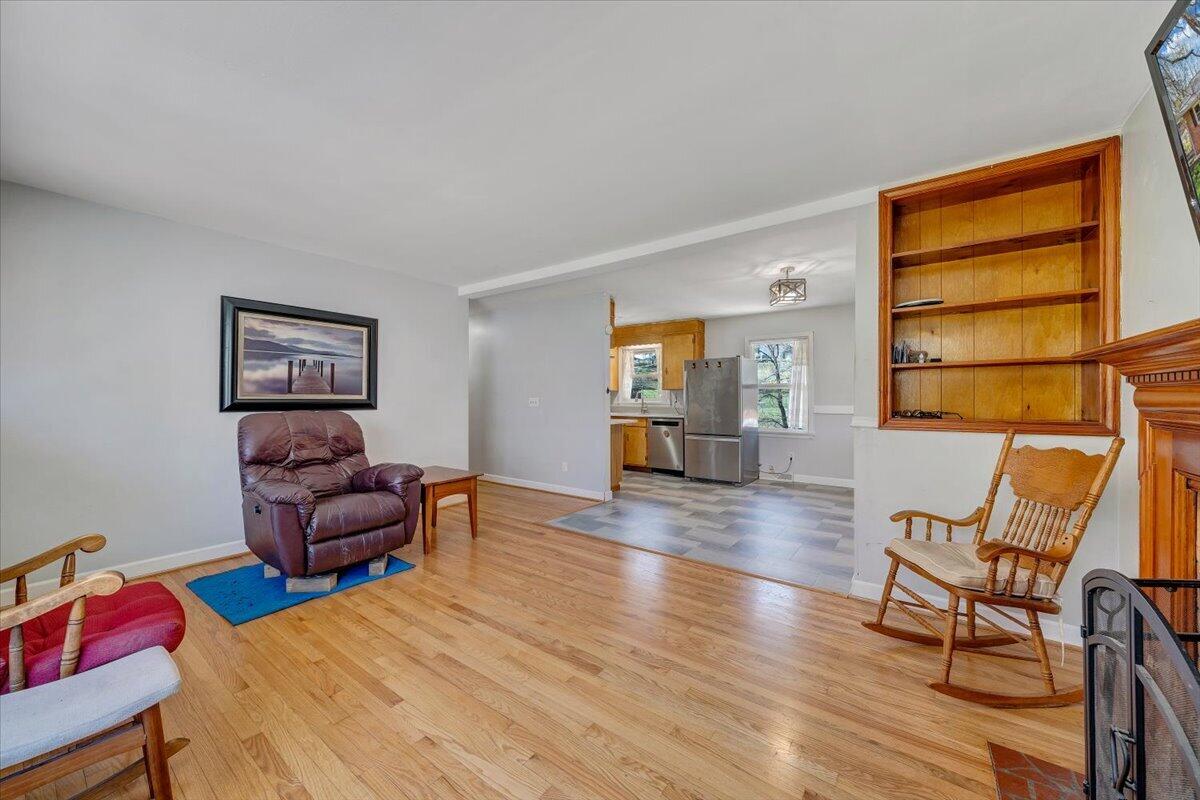 2129 Twelve Oclock Knob Road Salem, VA 24153 - Photo 8 of 48 a bedroom with furniture and wooden floor