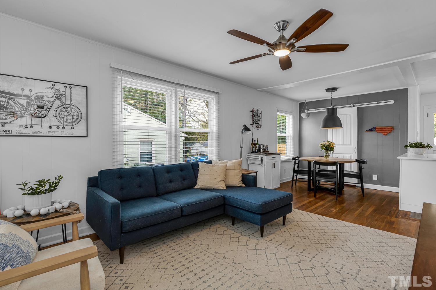 2456 Milburnie Road Raleigh, NC 27610 - Photo 4 of 23 a living room with furniture and a large window