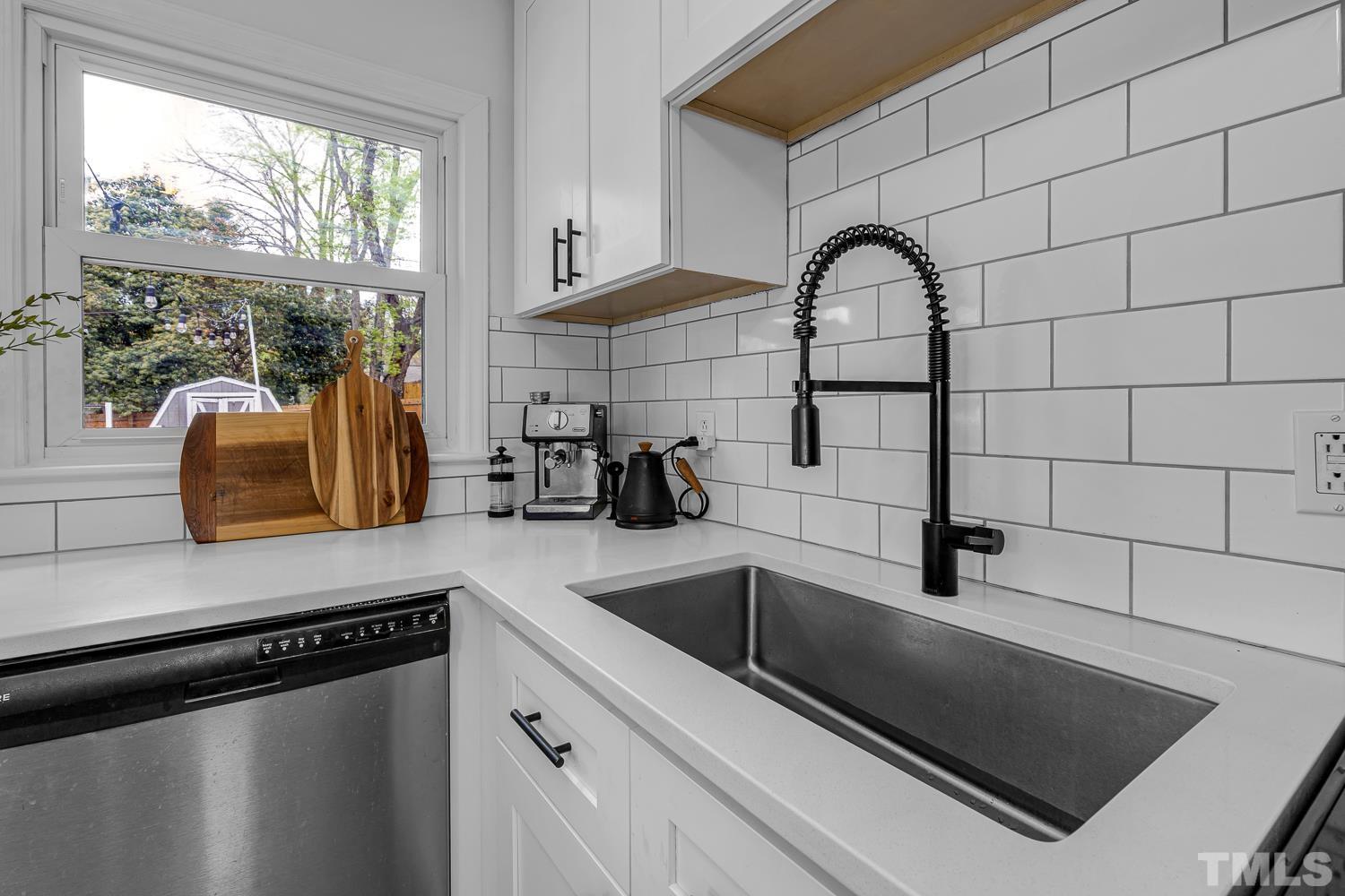 2456 Milburnie Road Raleigh, NC 27610 - Photo 10 of 23 a close view of sink and tap