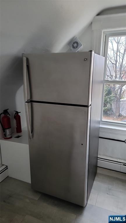 165 Main Street, Unit SECOND Garfield, NJ 07026 - Photo 7 of 12 a white refrigerator freezer and a dishwasher in a kitchen