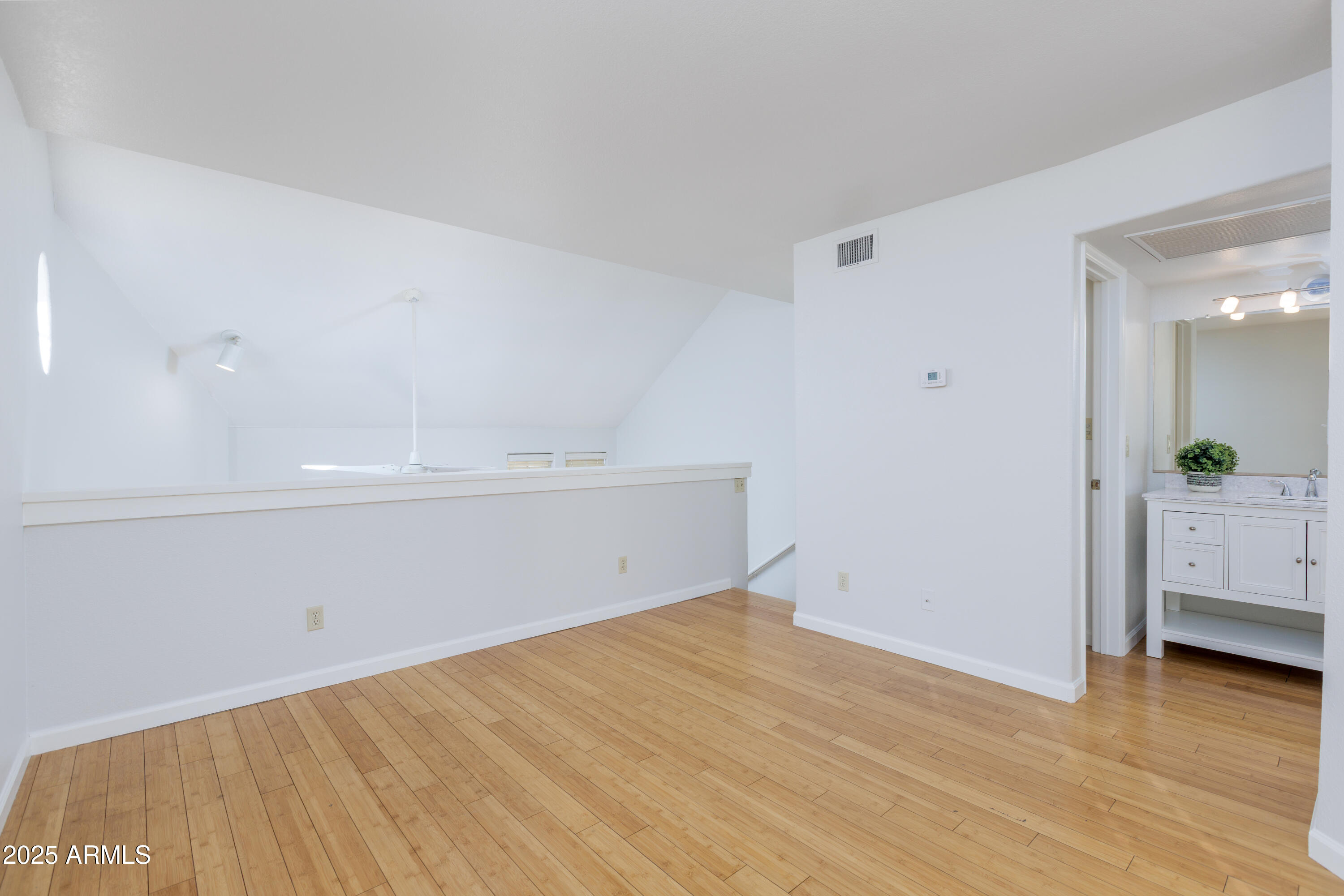 1025 East Highland Avenue, Unit 30 Phoenix, AZ 85014 - Photo 14 of 20 a view of an empty room