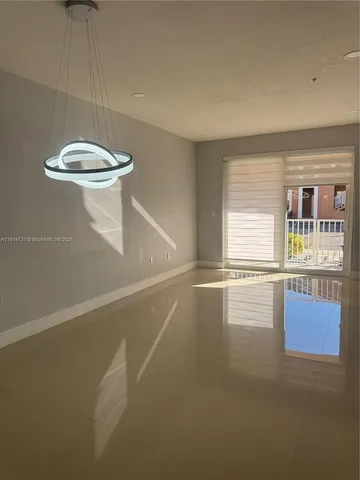 a bathroom with a sink a mirror and a shower