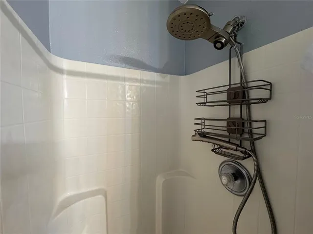 a close view of light fixtures and stairs