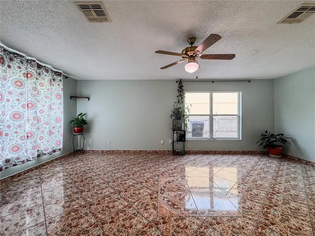 a view of a livingroom with a workspace