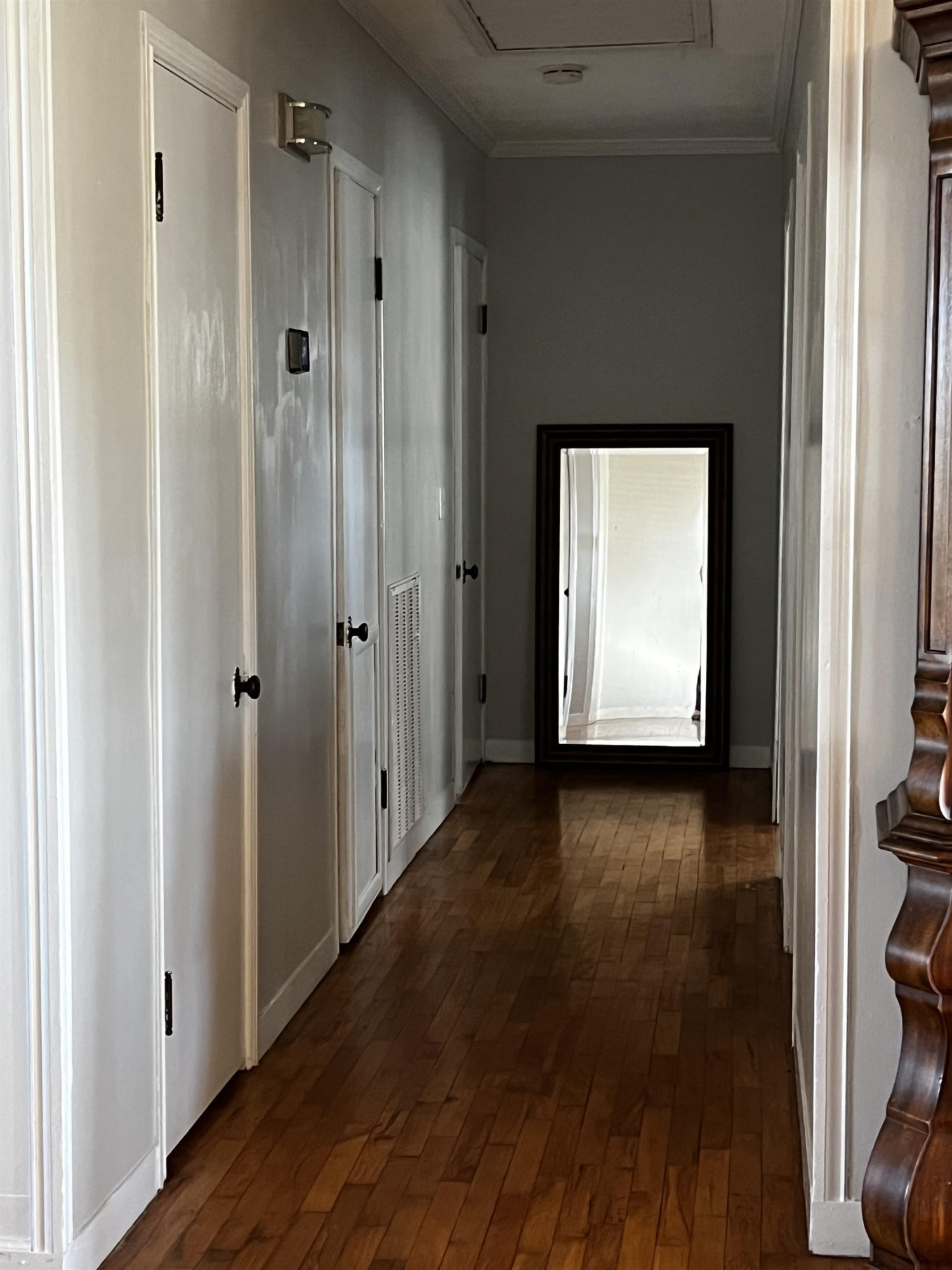 619 South Trenton Street Rutherford, TN 38369 - Photo 15 of 22 a view of a hallway with wooden floor and closet area