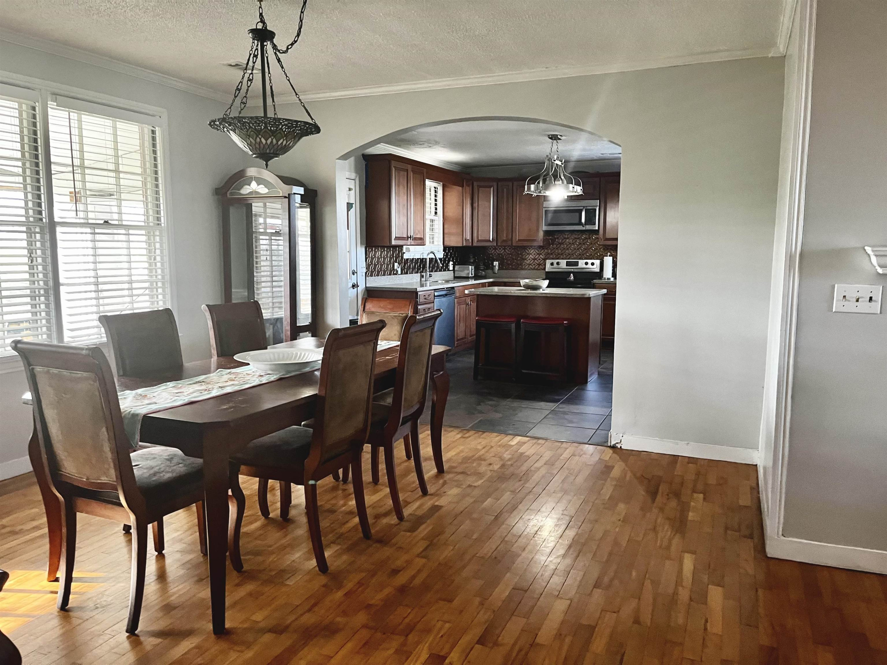 619 South Trenton Street Rutherford, TN 38369 - Photo 5 of 22 a view of a dining room with furniture window and wooden floor