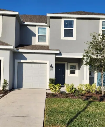 a front view of house with yard