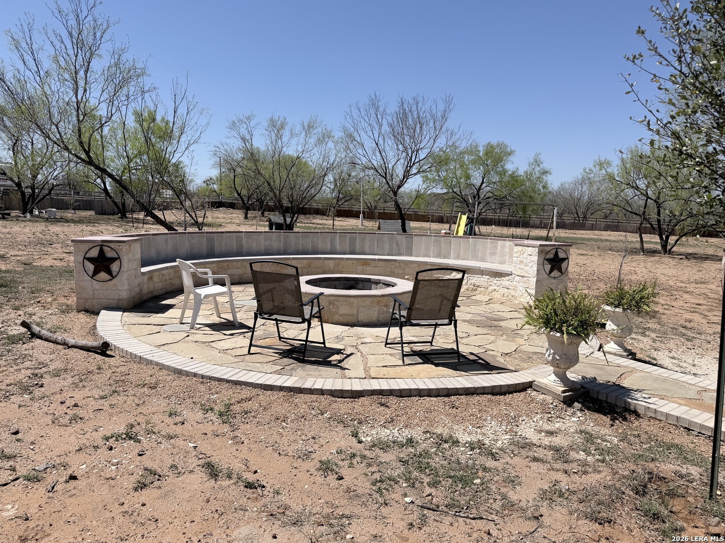 152 County Roads 2667 Devine, TX 78016 - Photo 13 of 51 a view of a lake with a patio
