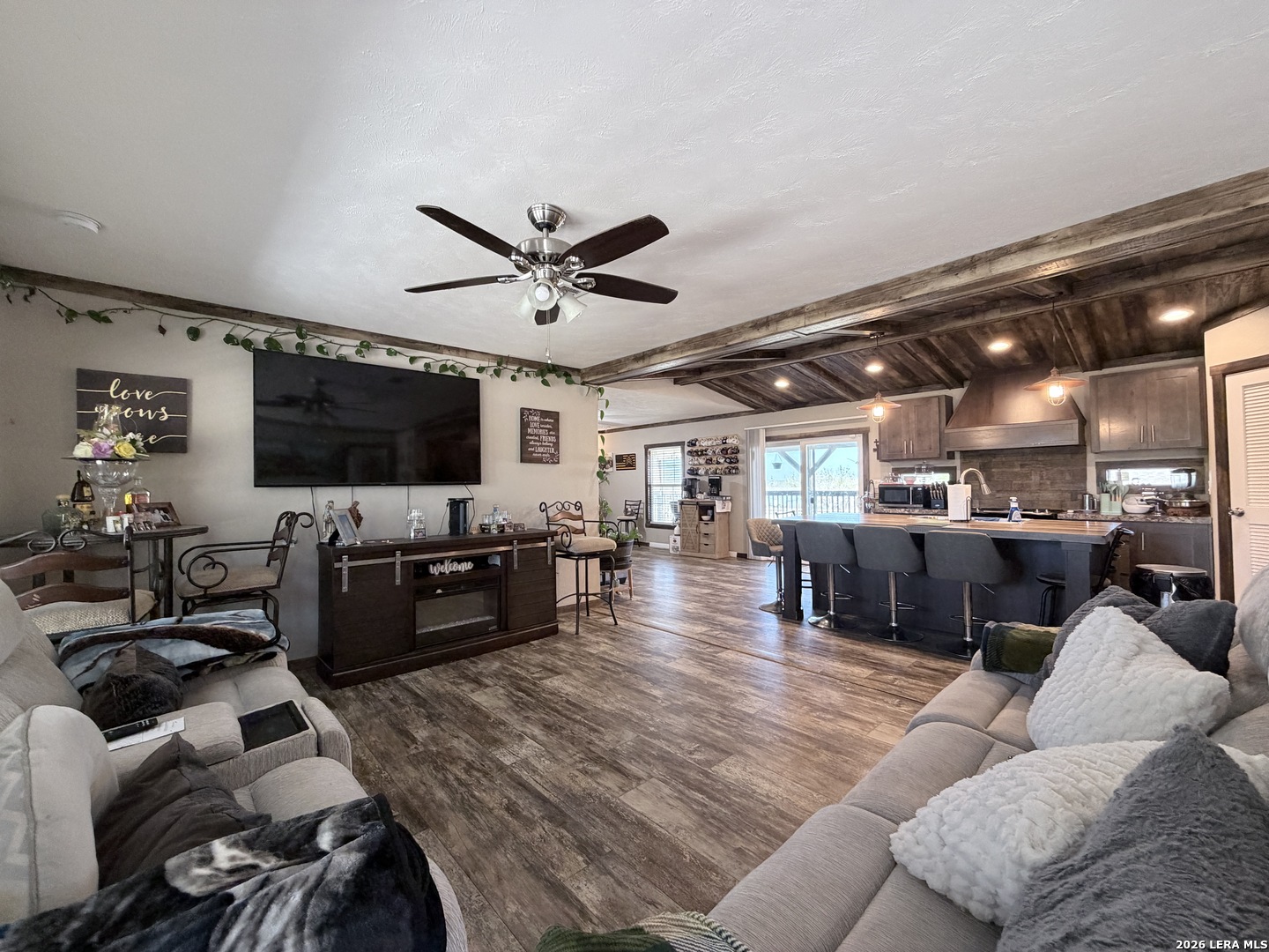 152 County Roads 2667 Devine, TX 78016 - Photo 20 of 51 a living room with furniture and a flat screen tv