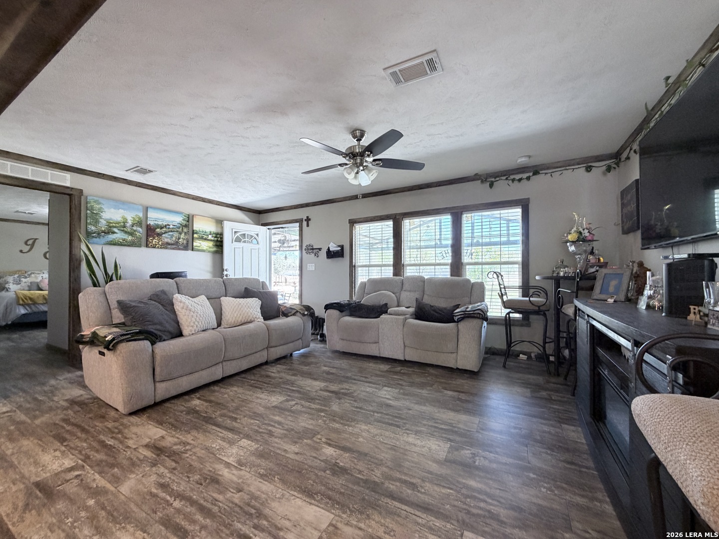 152 County Roads 2667 Devine, TX 78016 - Photo 23 of 51 a living room with furniture and a large window
