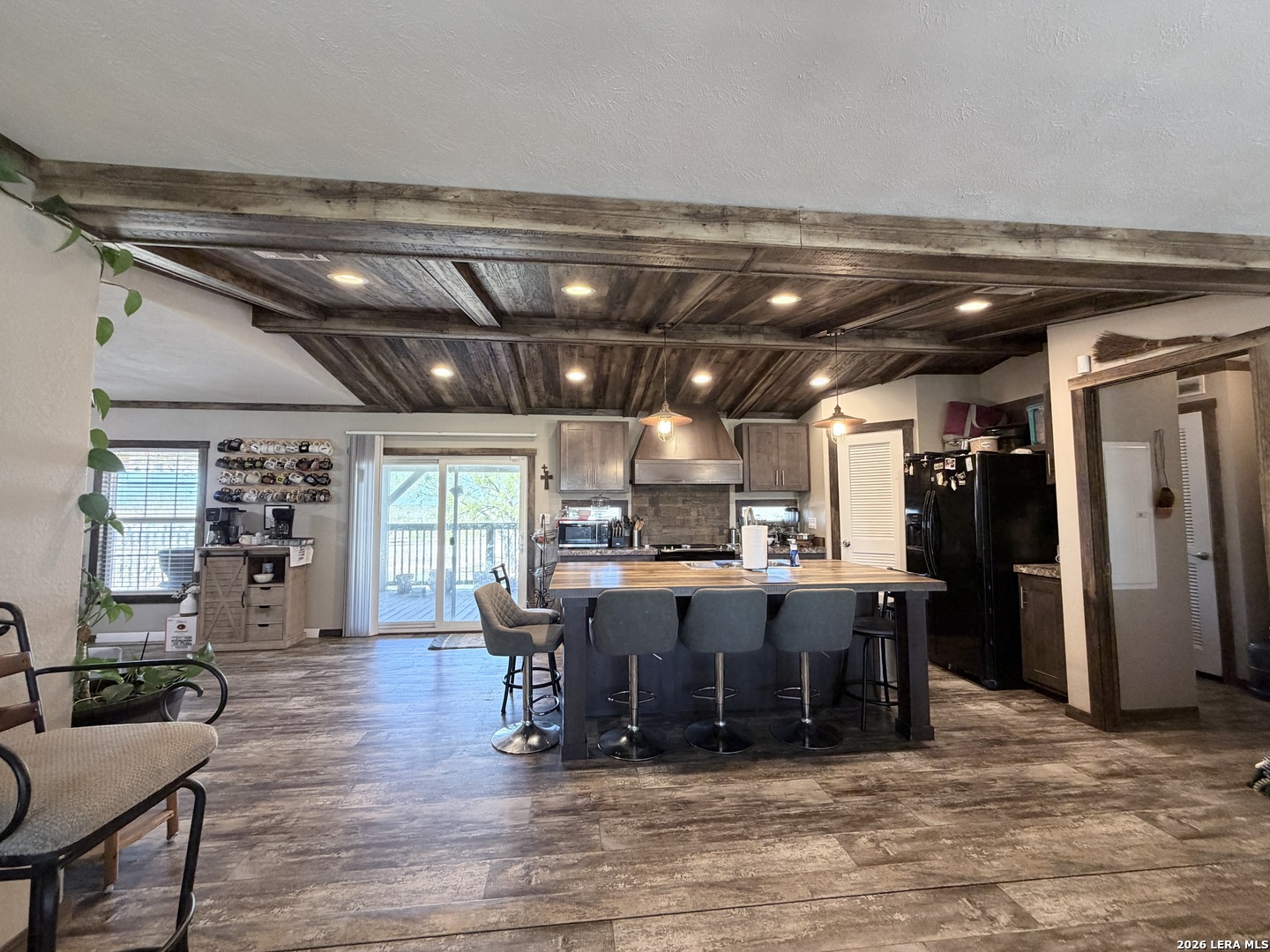 152 County Roads 2667 Devine, TX 78016 - Photo 24 of 51 a view of a dining room with furniture window and wooden floor