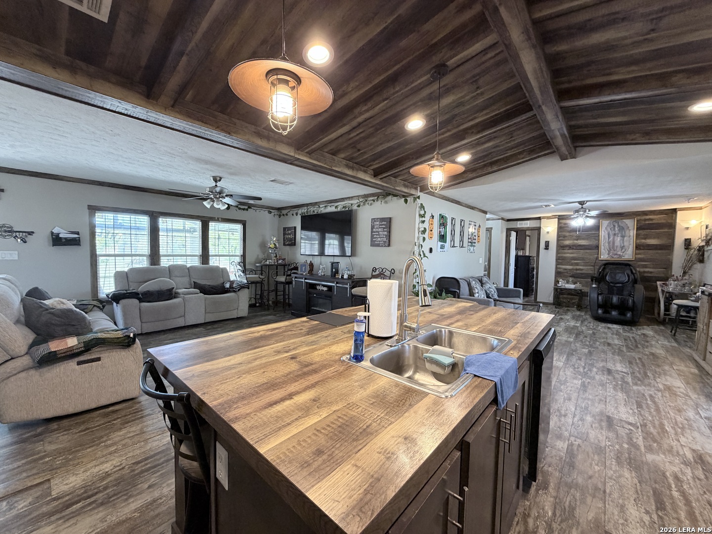 152 County Roads 2667 Devine, TX 78016 - Photo 28 of 51 a living room with lots of furniture and kitchen view