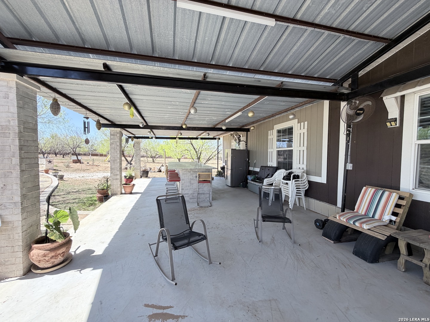 152 County Roads 2667 Devine, TX 78016 - Photo 9 of 51 a outdoor space with furniture