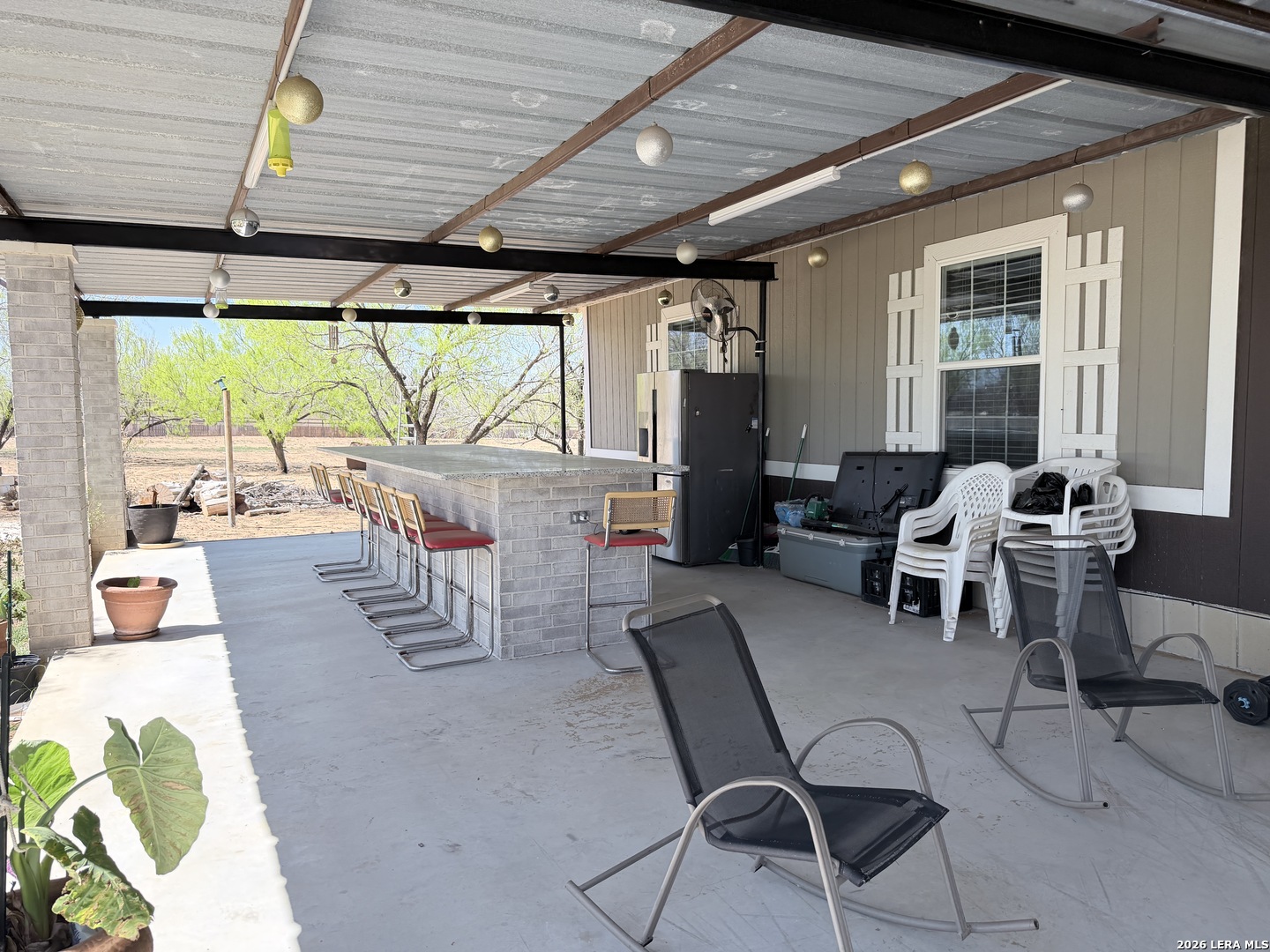 152 County Roads 2667 Devine, TX 78016 - Photo 10 of 51 a outdoor space with furniture