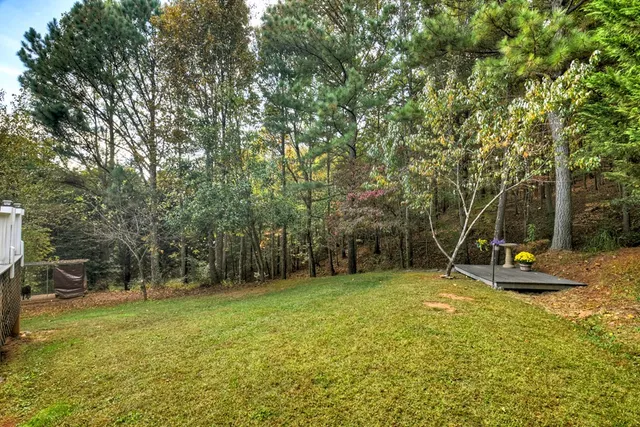 a view of balcony with furniture