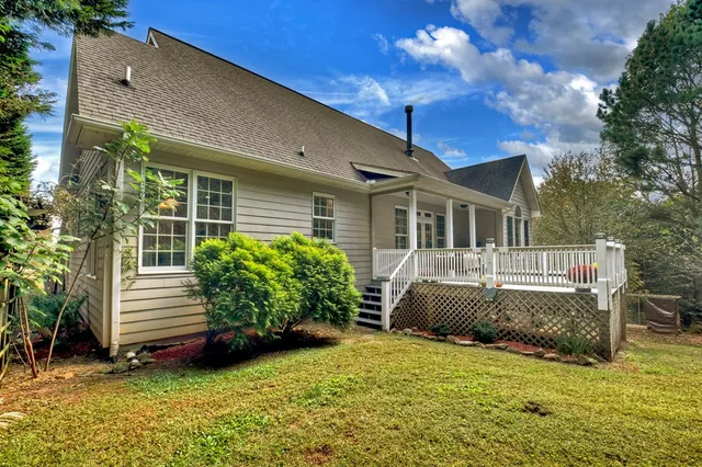 a vase of flowers sitting on a floor