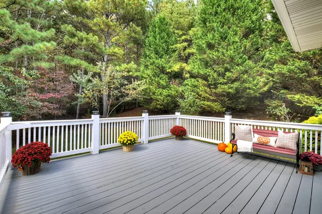 a living room with fireplace furniture and a flat screen tv