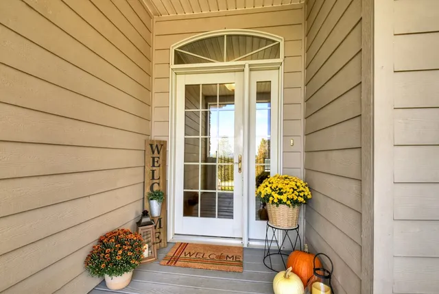 a living room with furniture and a table