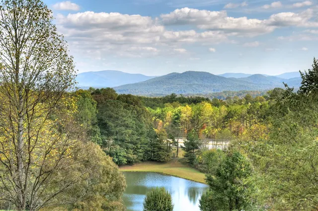 a view of lake with mountain