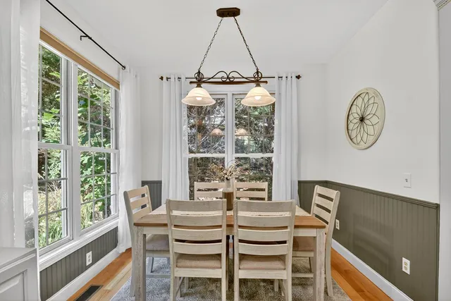 a bedroom with a bed and a potted plant