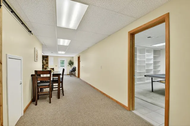 a living room with furniture and a table