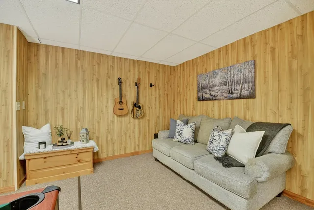 a bedroom with a large bed and a closet