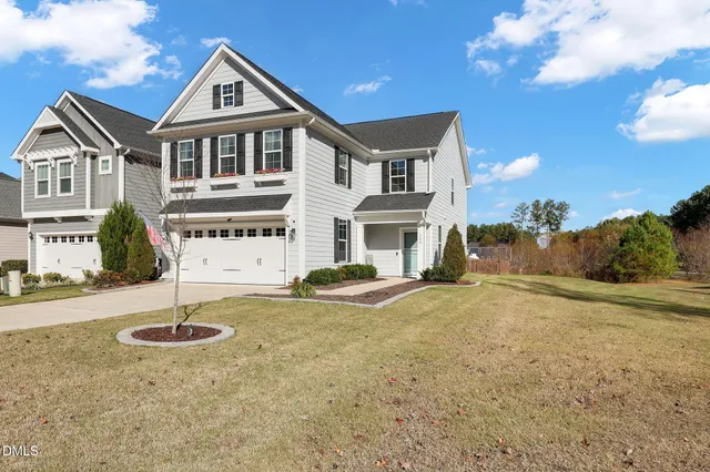 a view of a house with a big yard