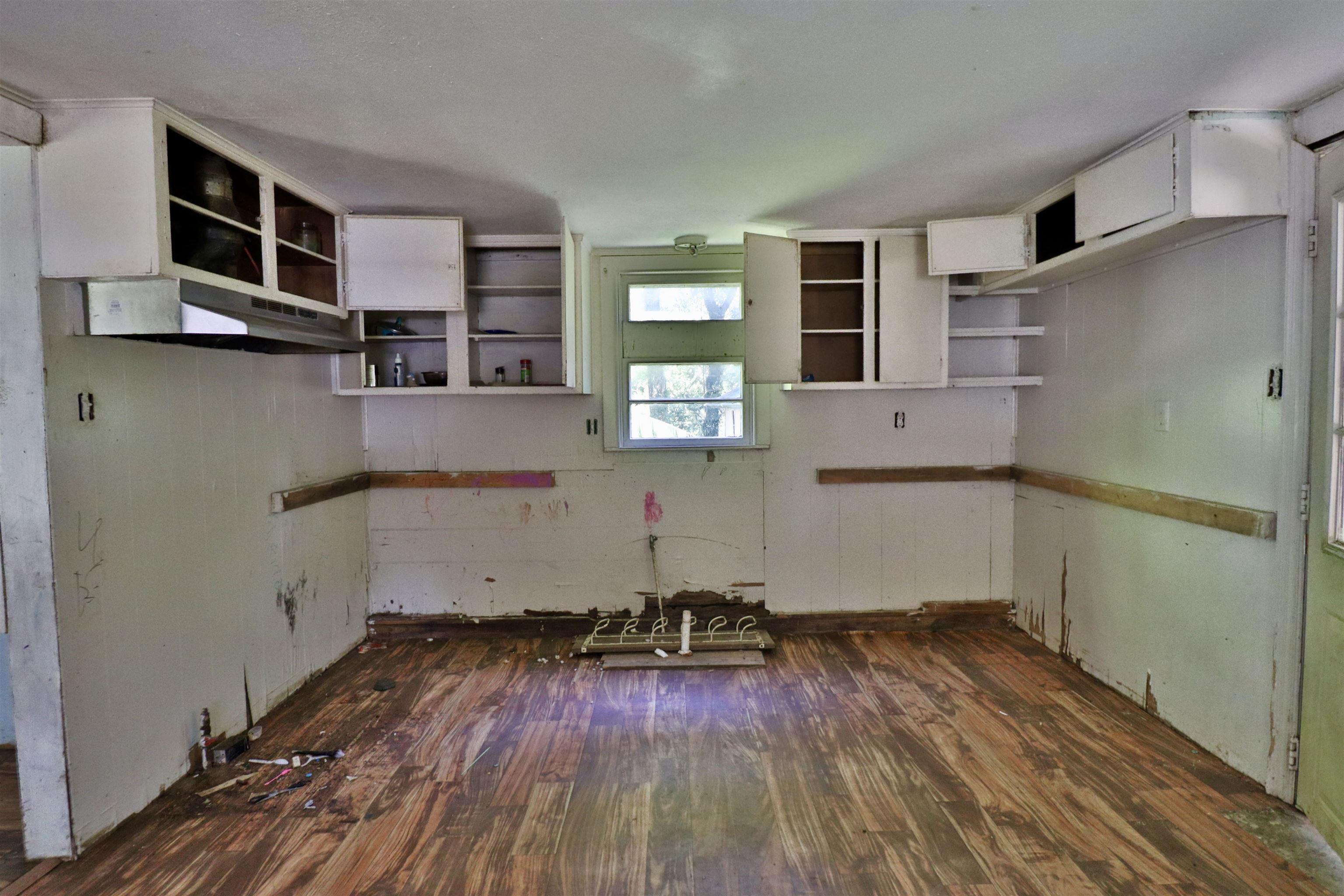 2464 Edith-Nankipoo Road Ripley, TN 38063 - Photo 5 of 25 a room with cabinets and wooden floor
