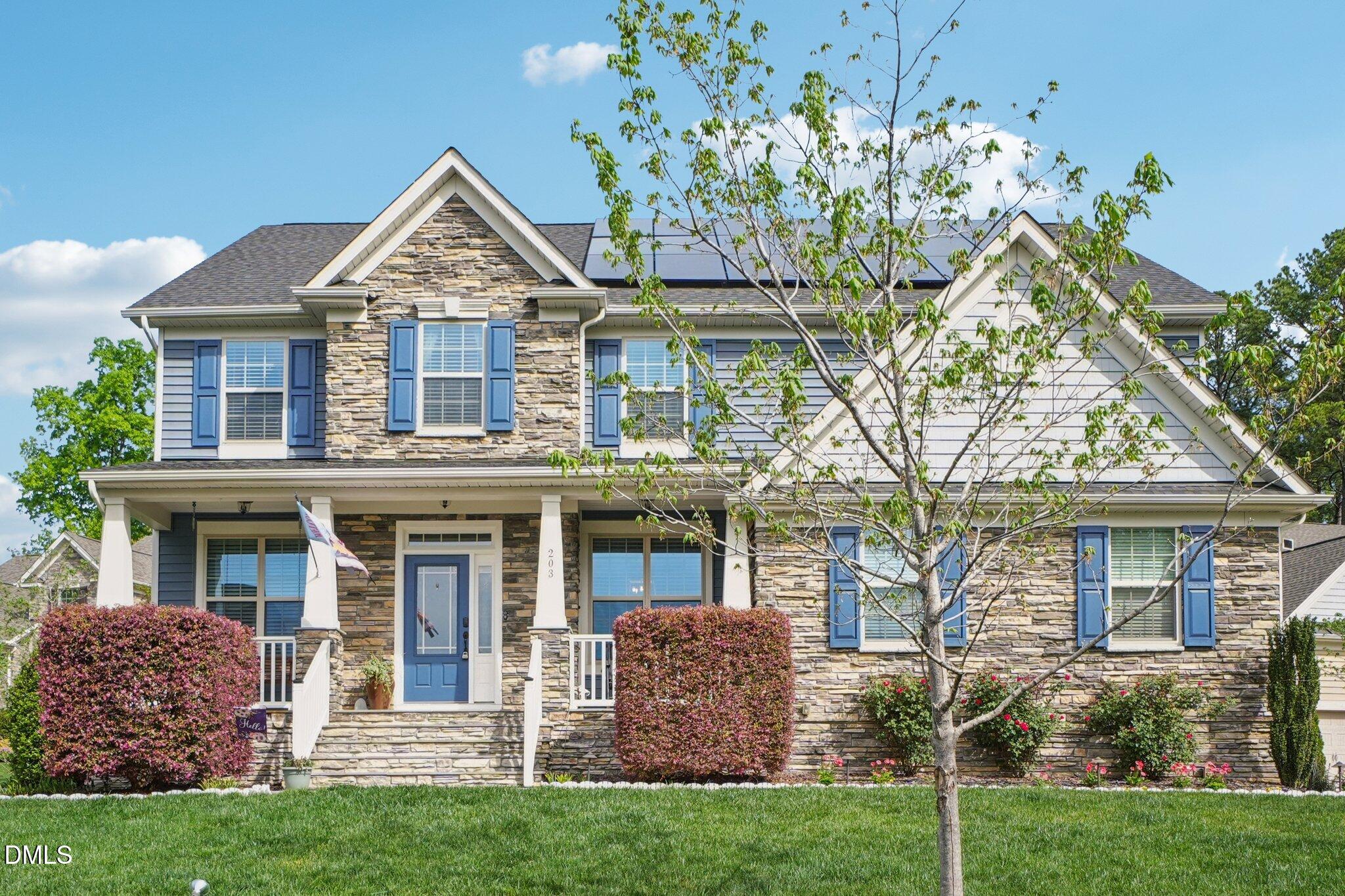 203 Hico Way Durham, NC 27703 - Photo 2 of 62 front view of a house with a yard