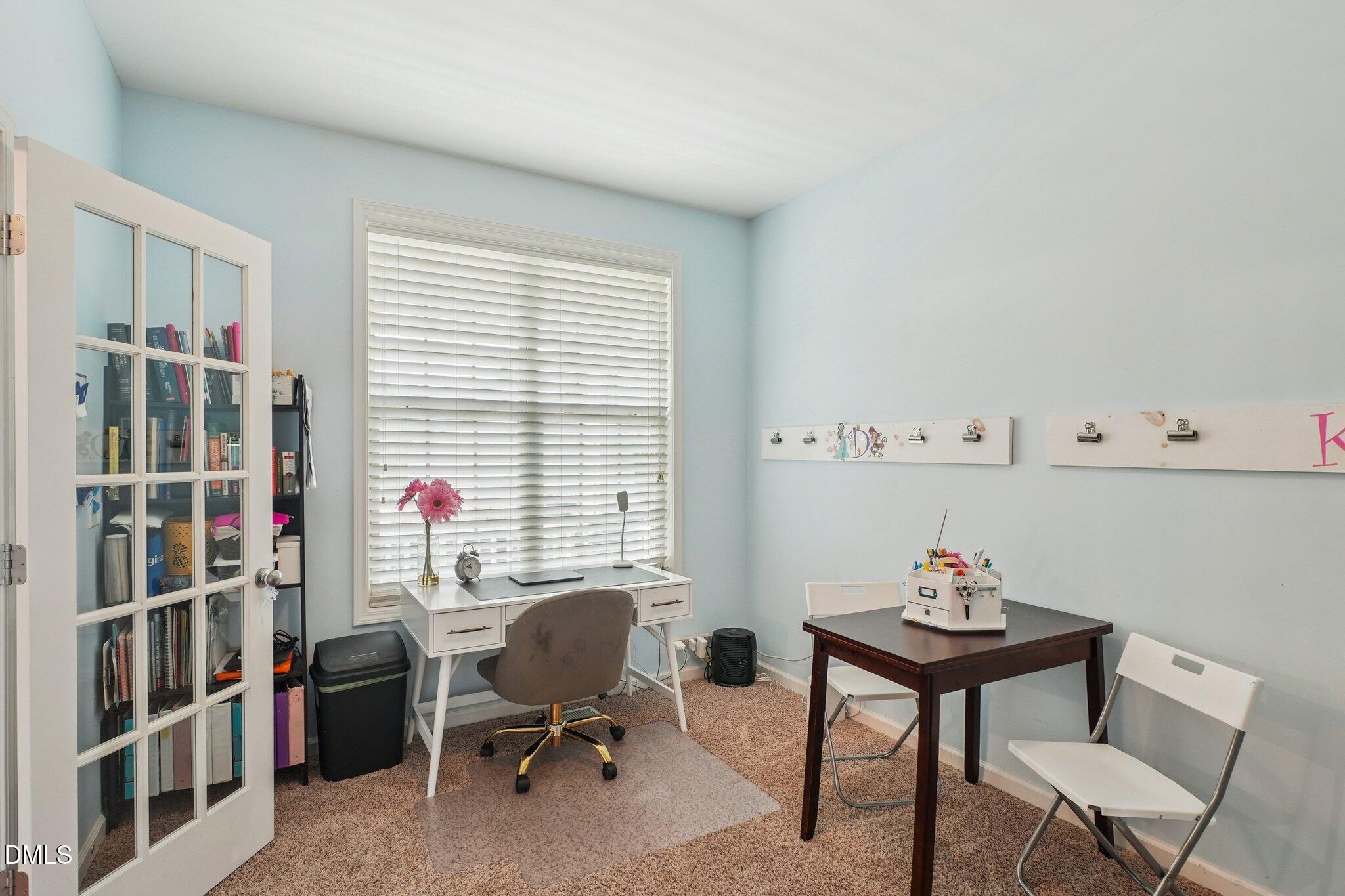 203 Hico Way Durham, NC 27703 - Photo 21 of 62 a view of a workspace with furniture and a window