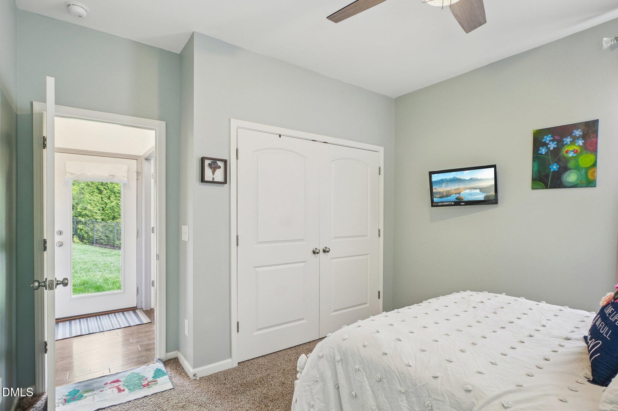 203 Hico Way Durham, NC 27703 - Photo 25 of 62 a bedroom with a bed and a window