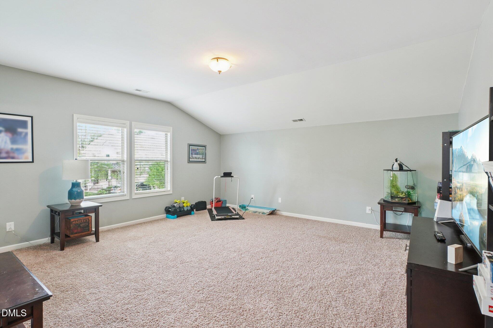 203 Hico Way Durham, NC 27703 - Photo 27 of 62 a living room with furniture and a window