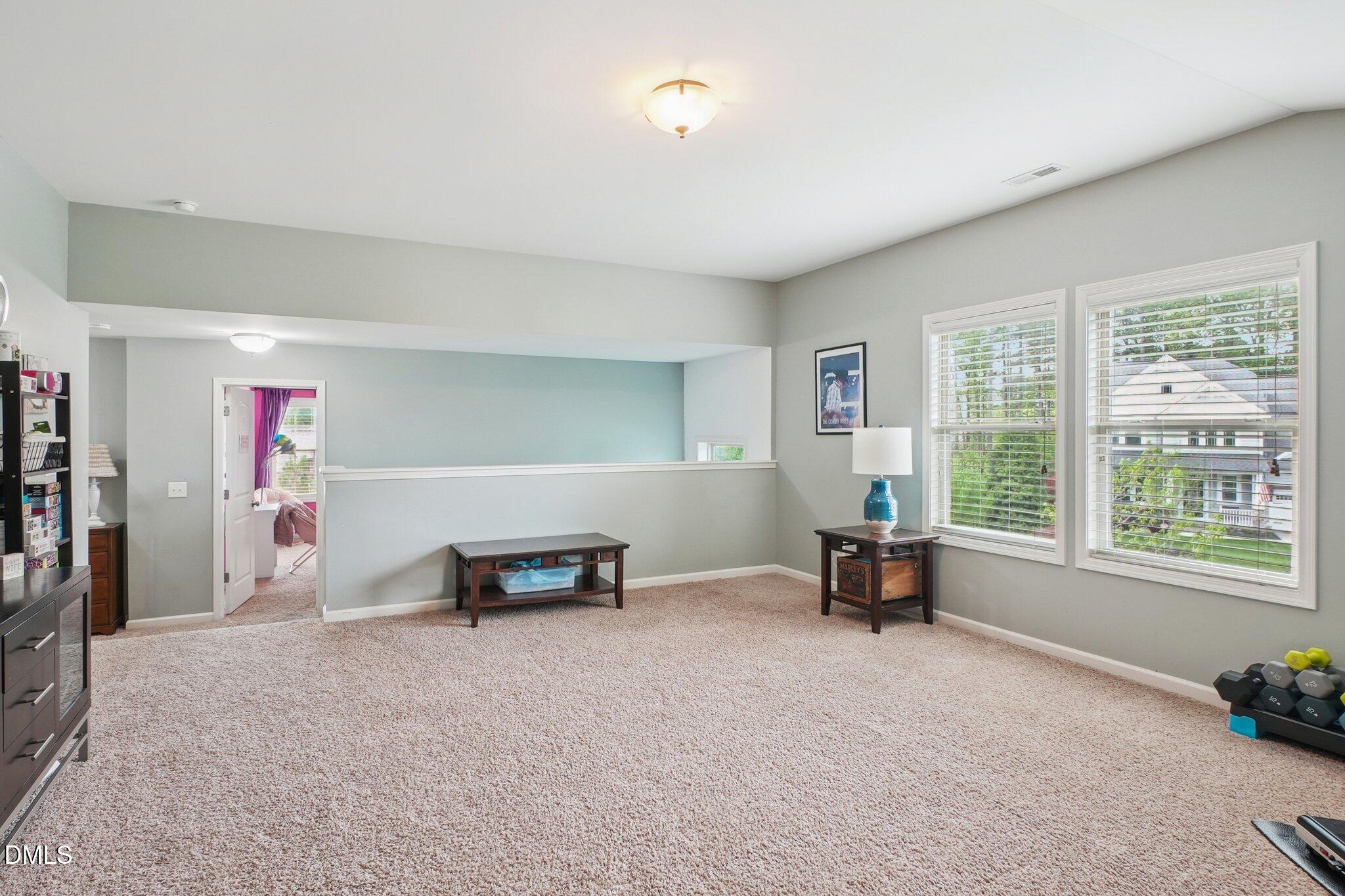 203 Hico Way Durham, NC 27703 - Photo 28 of 62 a living room with furniture and a window