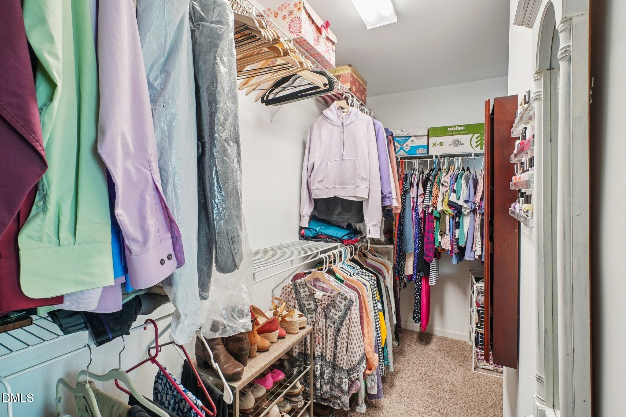 203 Hico Way Durham, NC 27703 - Photo 43 of 62 a view of walk in closet with clothes
