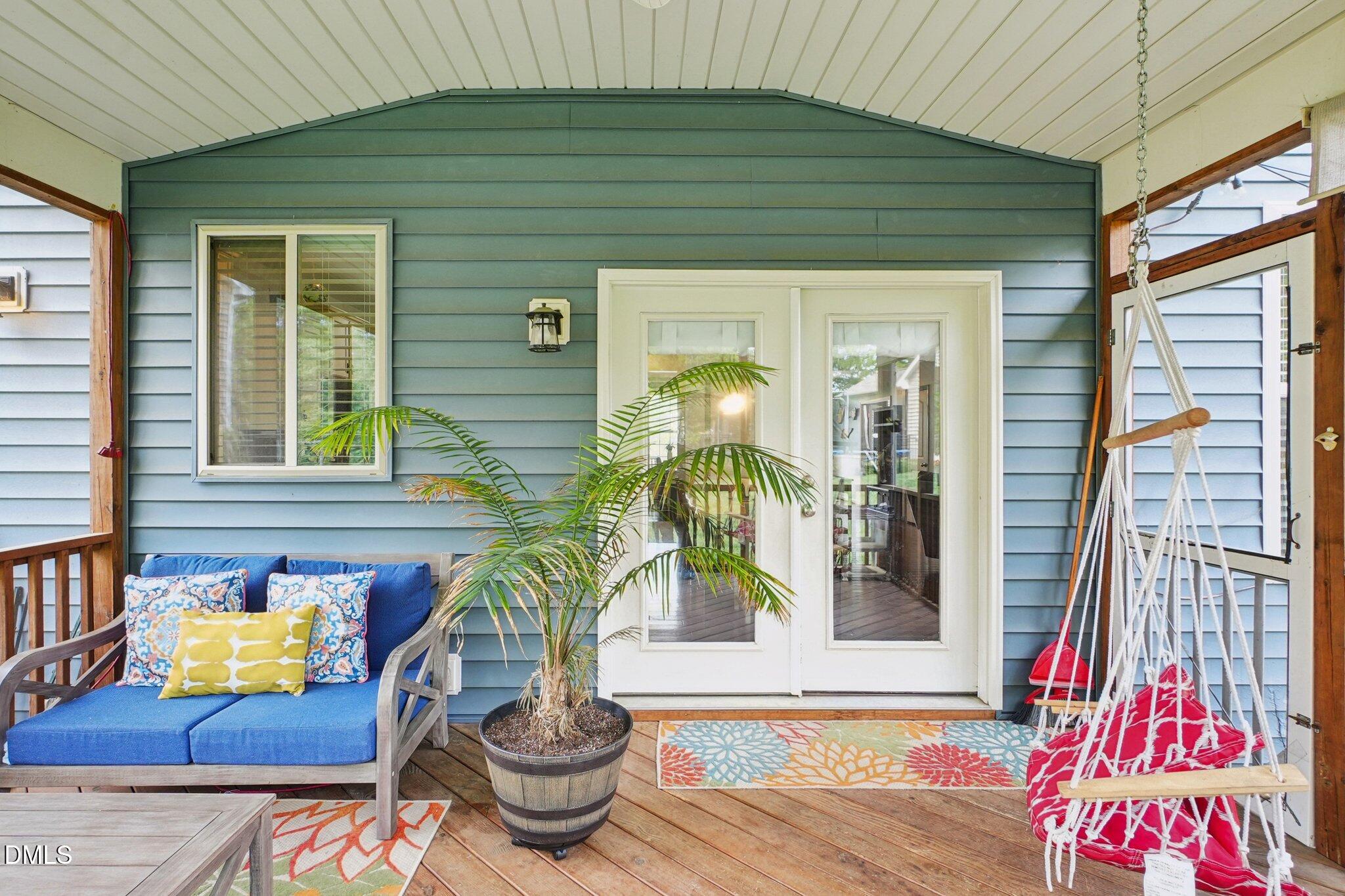203 Hico Way Durham, NC 27703 - Photo 46 of 62 a front view of a house with outdoor seating