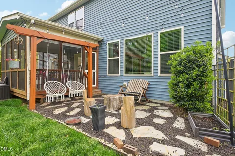 an aerial view of a house with outdoor space