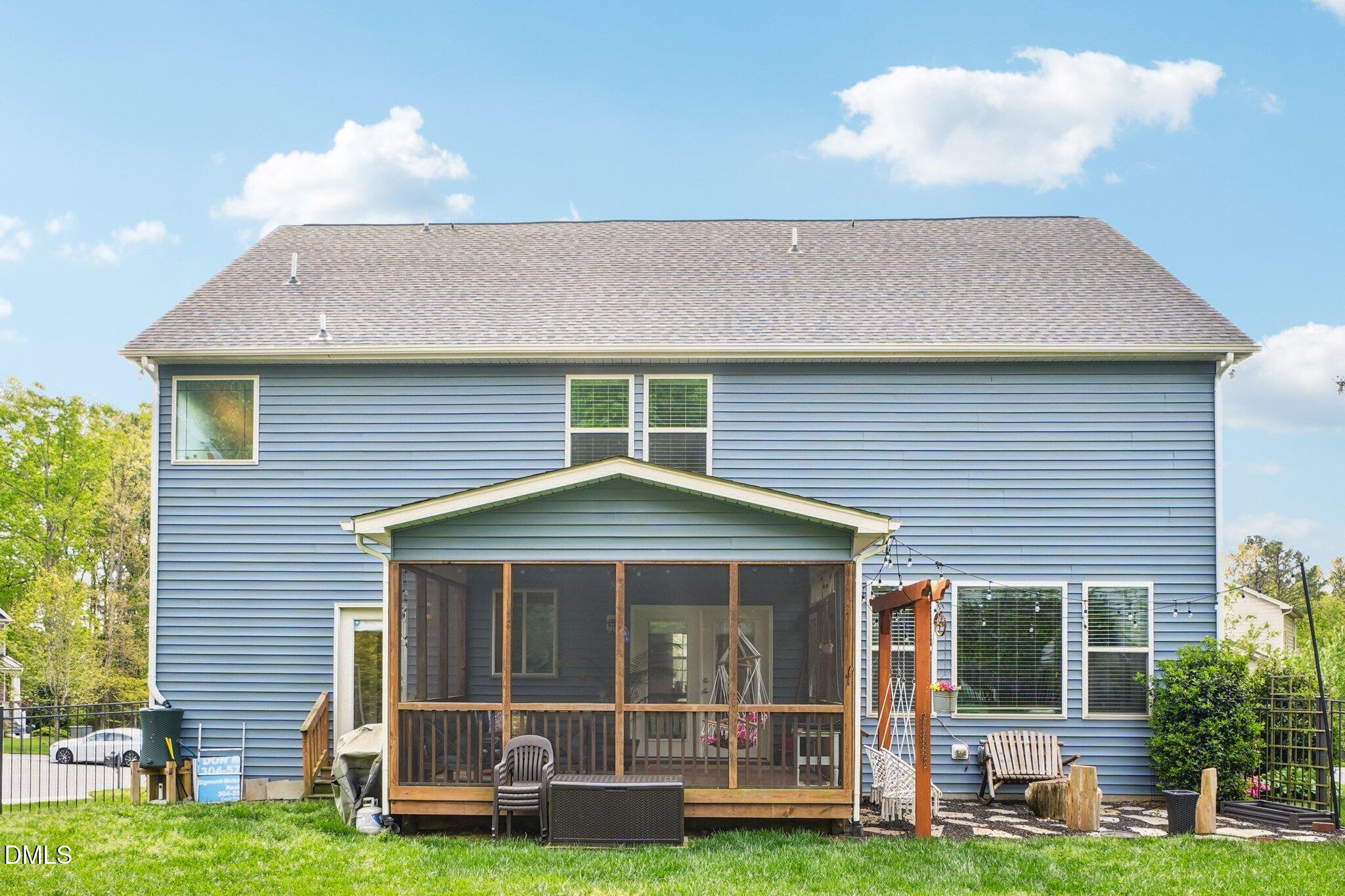 203 Hico Way Durham, NC 27703 - Photo 50 of 62 a front view of a house with a yard