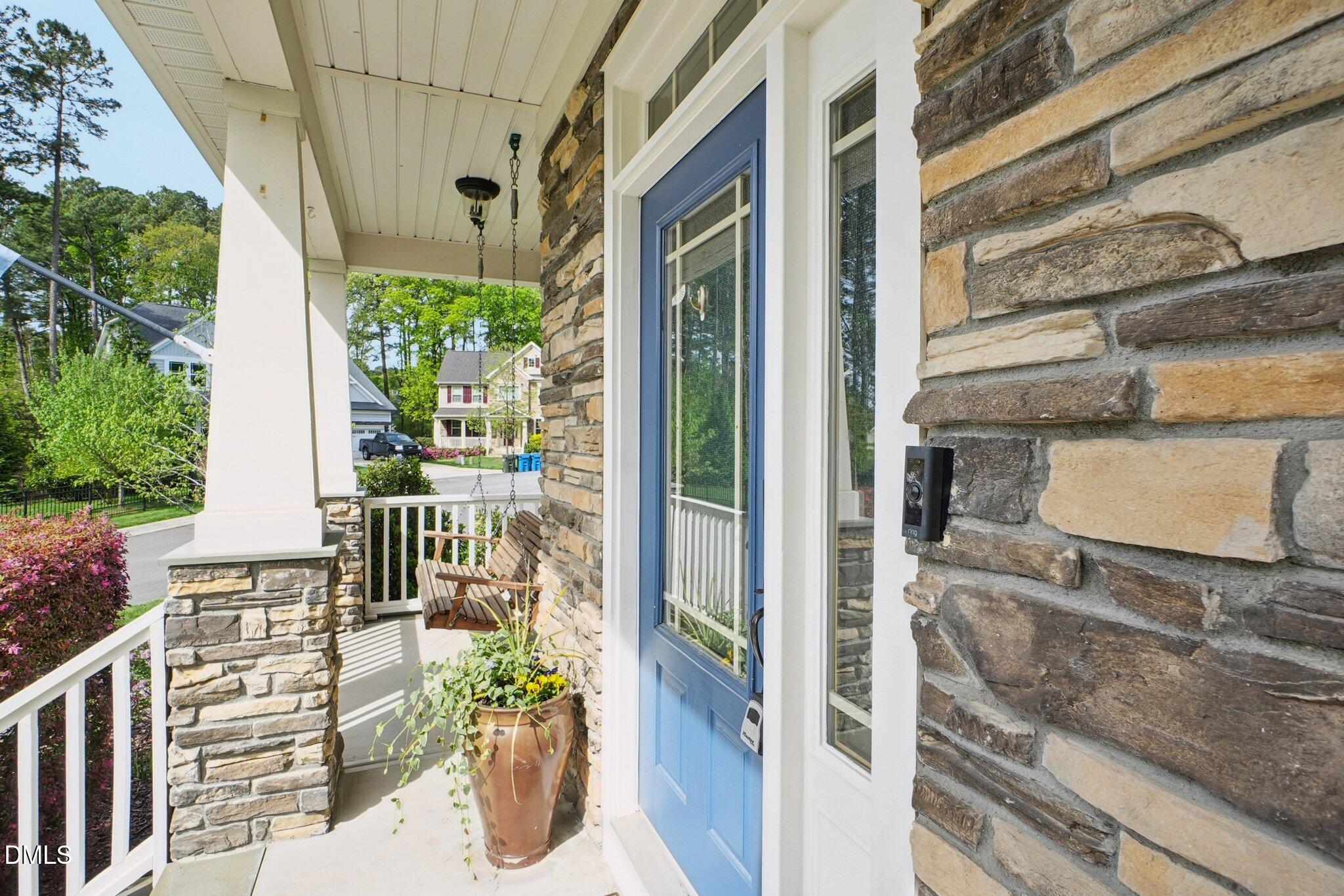 203 Hico Way Durham, NC 27703 - Photo 5 of 62 a view of a balcony with wooden floor and outdoor seating