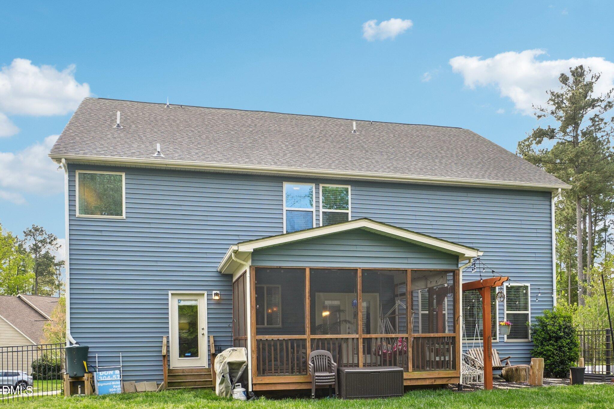 203 Hico Way Durham, NC 27703 - Photo 51 of 62 a front view of a house with a garden