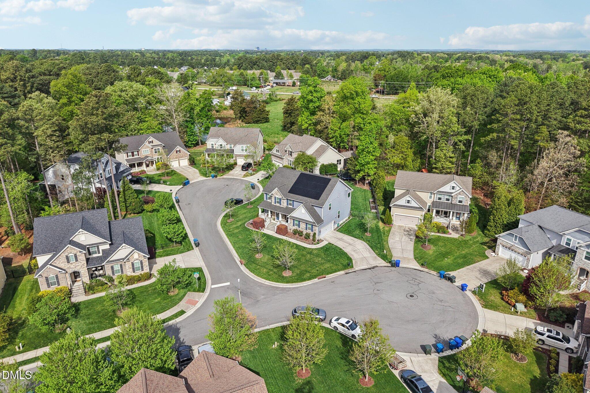 203 Hico Way Durham, NC 27703 - Photo 56 of 62 an aerial view of a house with garden space and street view