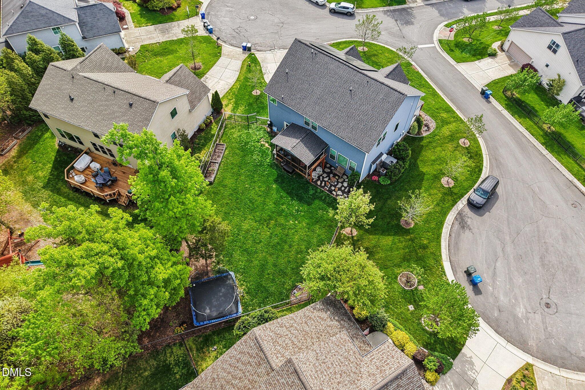203 Hico Way Durham, NC 27703 - Photo 62 of 62 an aerial view of a house with garden space and street view