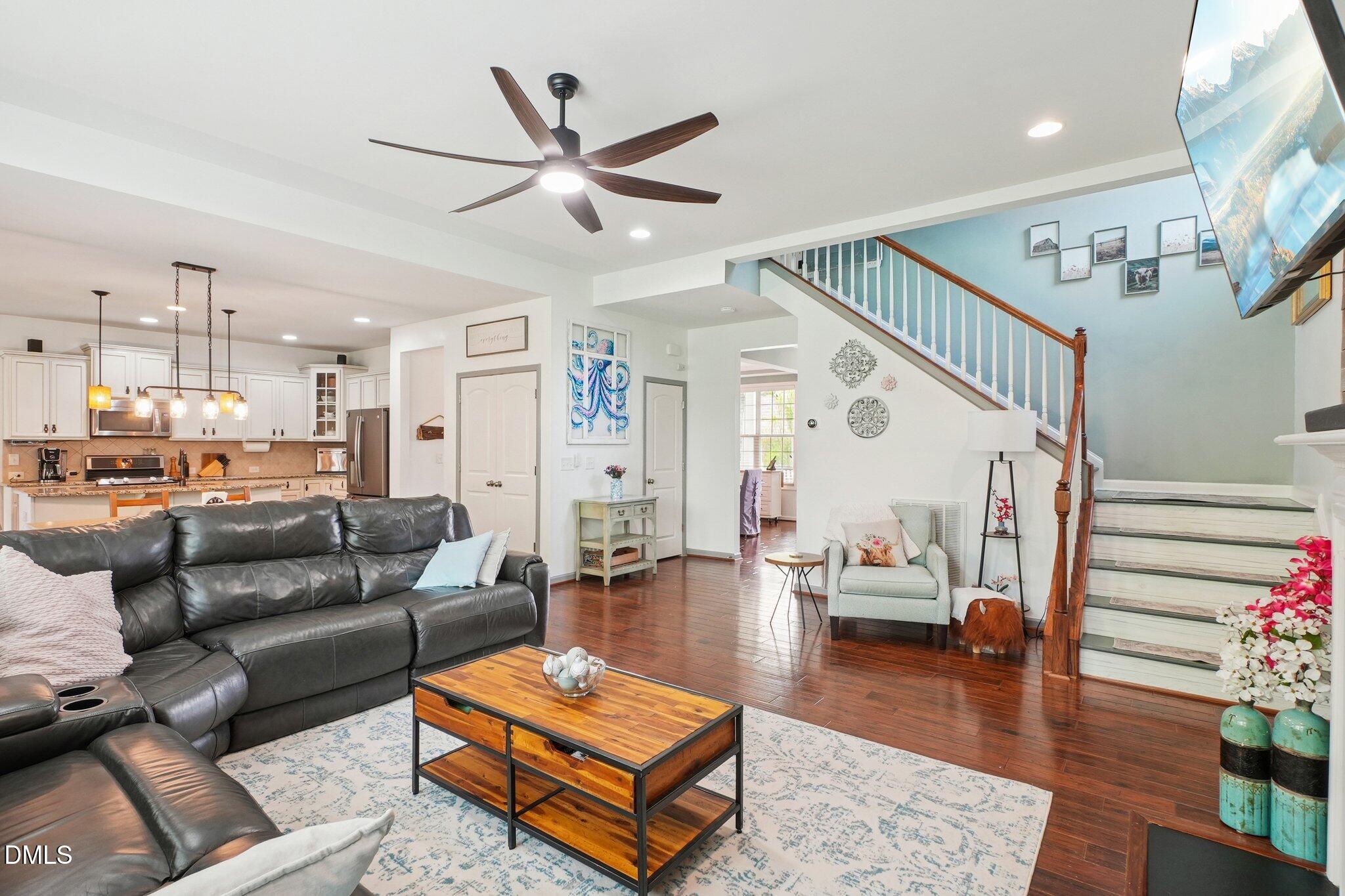 203 Hico Way Durham, NC 27703 - Photo 8 of 62 a living room with furniture and wooden floor