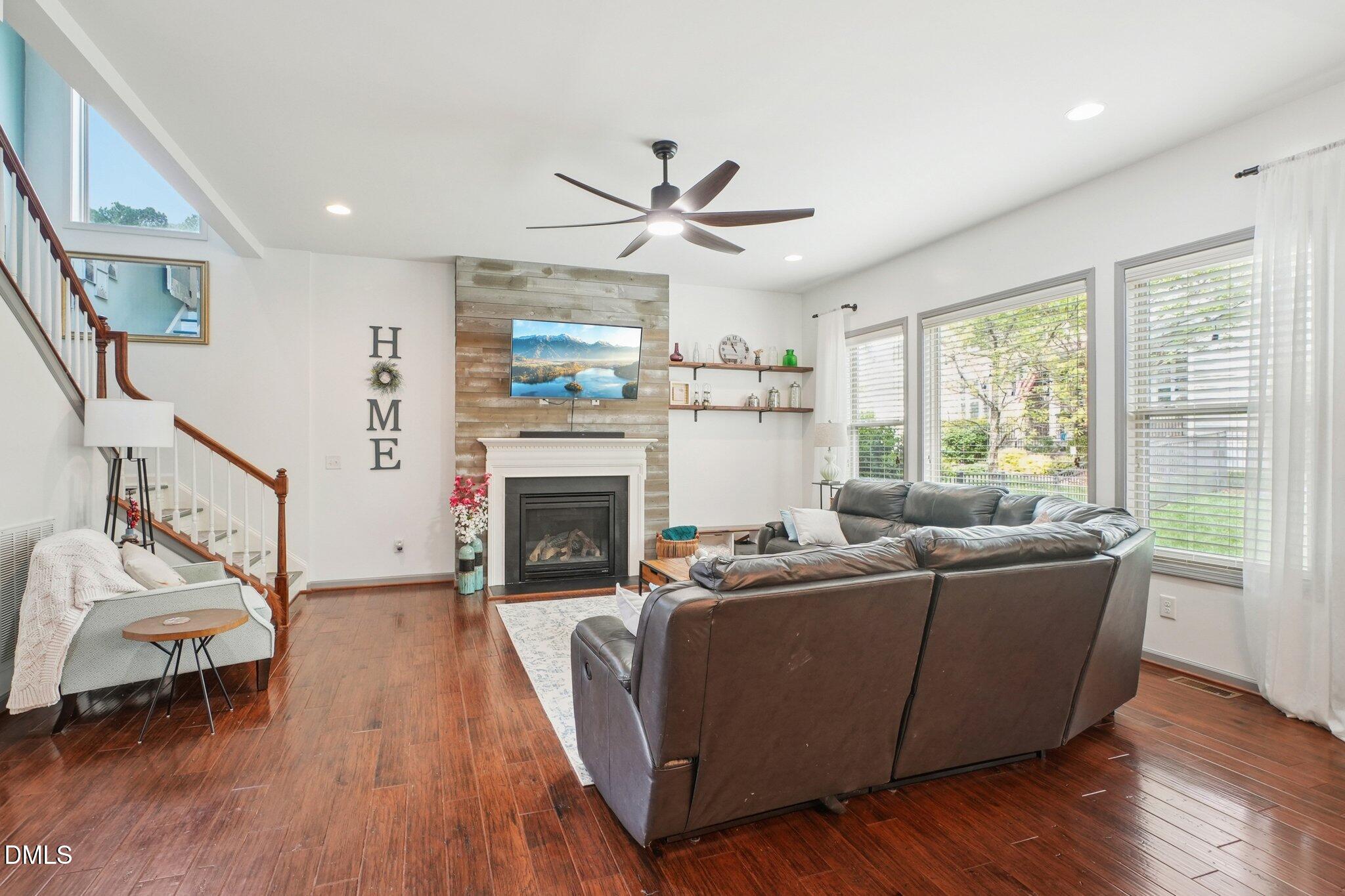 203 Hico Way Durham, NC 27703 - Photo 9 of 62 a living room with furniture and a fireplace