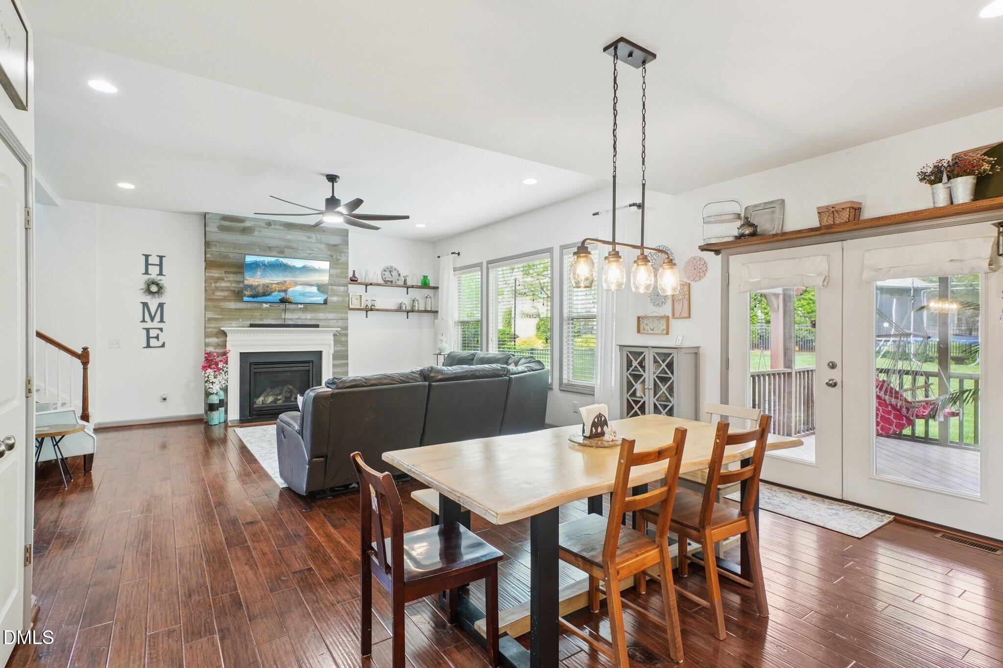 203 Hico Way Durham, NC 27703 - Photo 10 of 62 a view of a dining room with furniture window and wooden floor