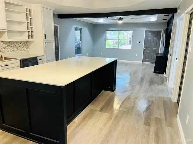 a room with a bed and a mirror