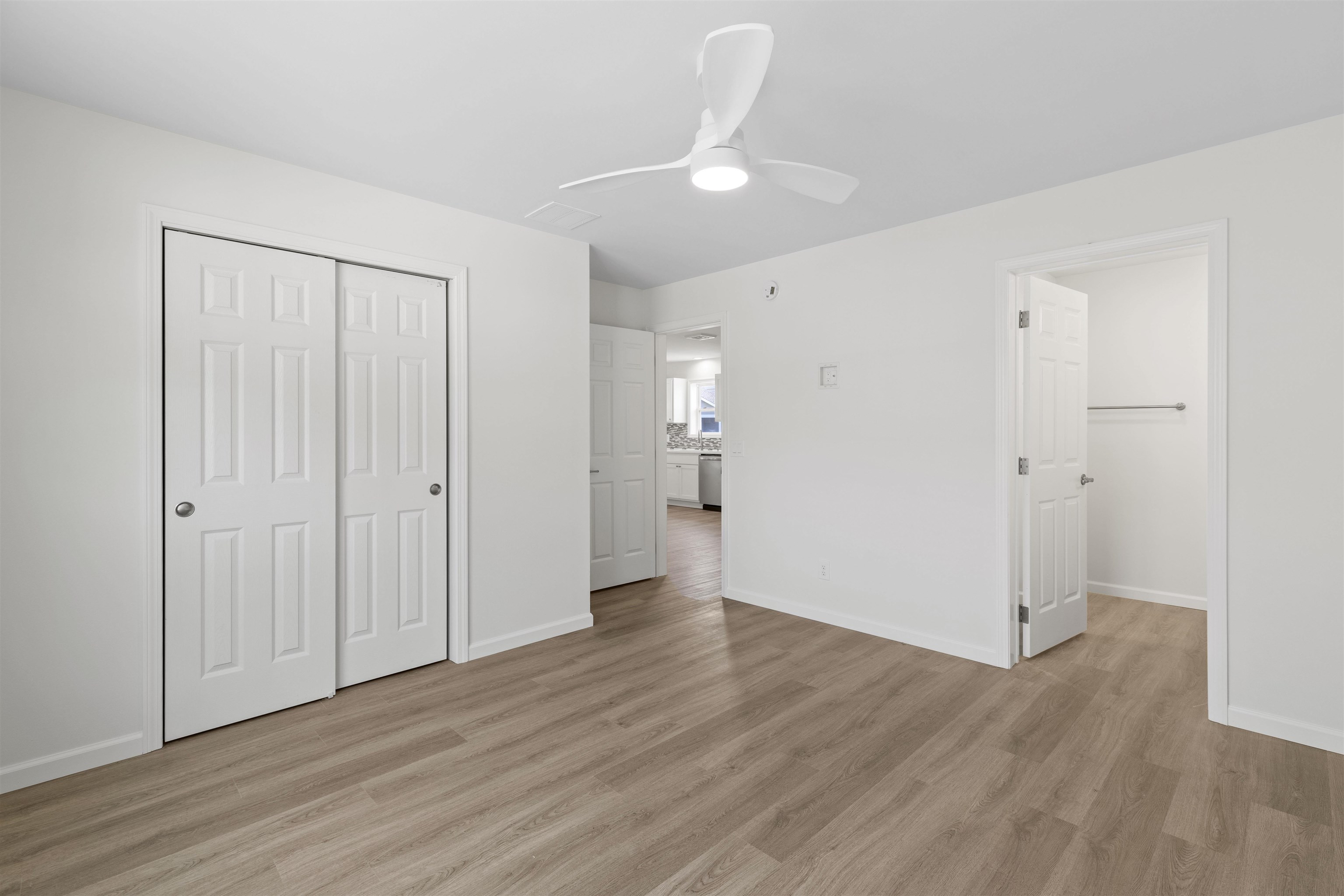 108 Sunray Road Del Haven, NJ 08251 - Photo 12 of 36 a view of an empty room with wooden floor