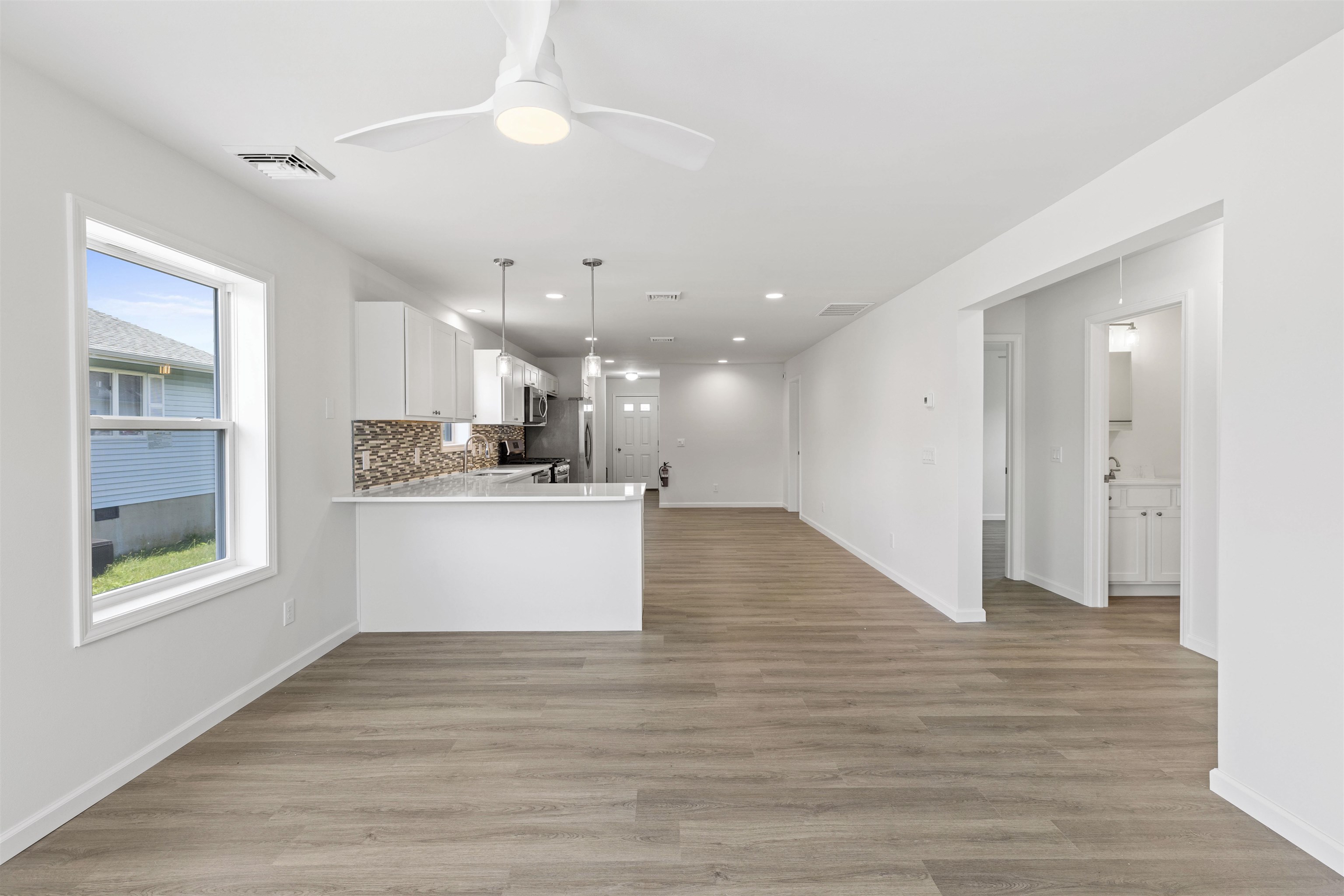 108 Sunray Road Del Haven, NJ 08251 - Photo 2 of 36 a view of kitchen with kitchen island white cabinets and refrigerator