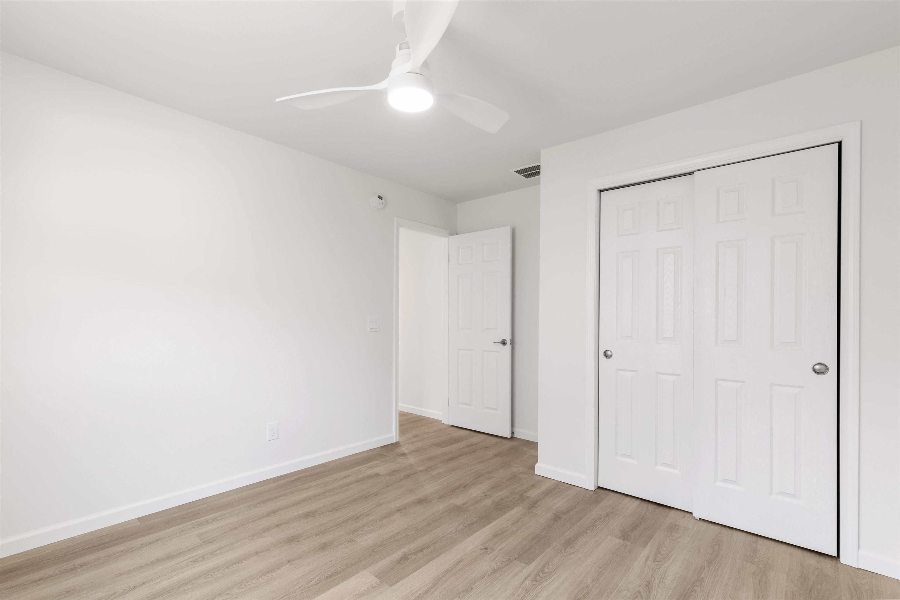 108 Sunray Road Del Haven, NJ 08251 - Photo 23 of 36 a view of an empty room with wooden floor