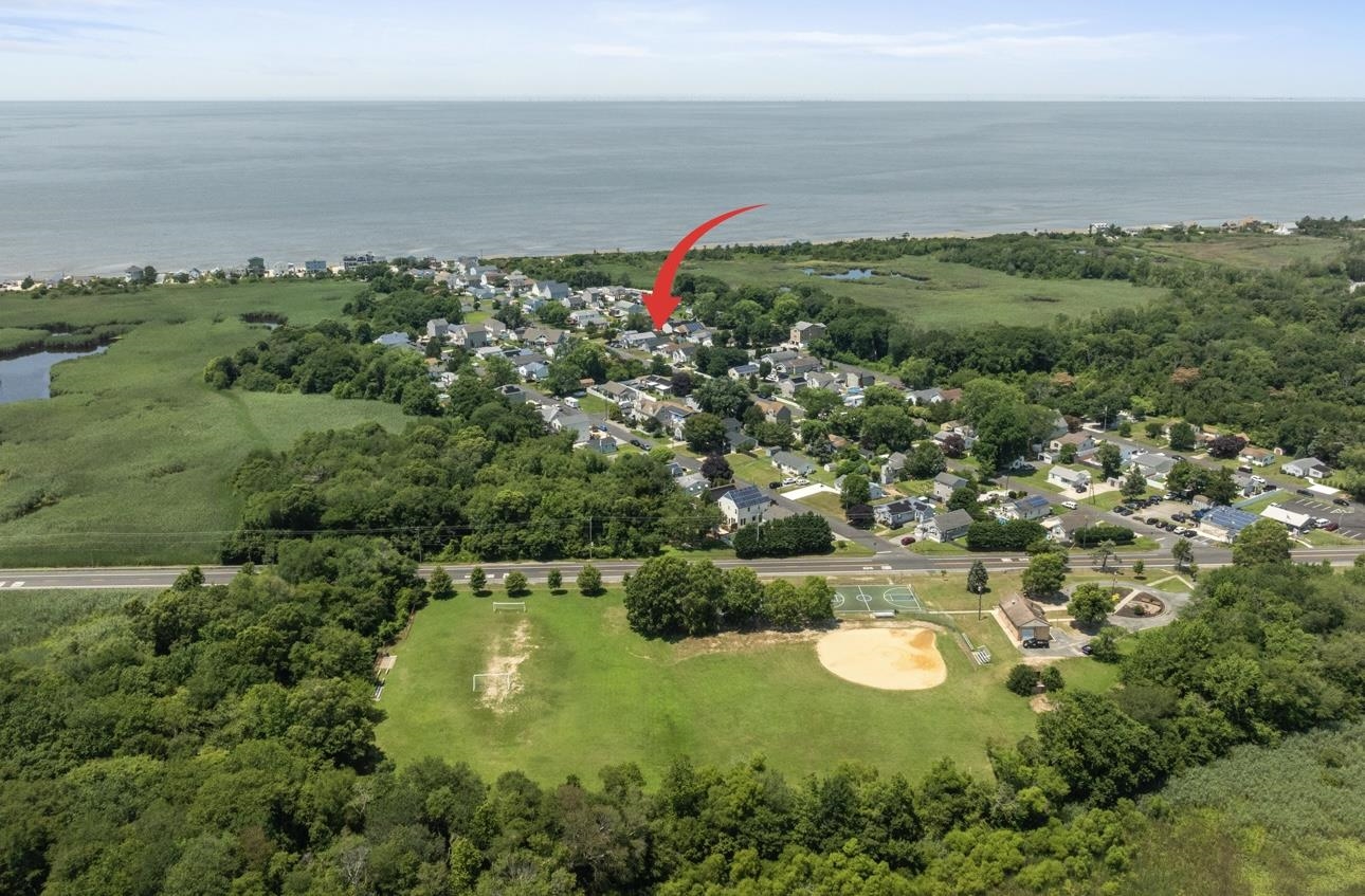 108 Sunray Road Del Haven, NJ 08251 - Photo 31 of 36 a view of a lake with a city