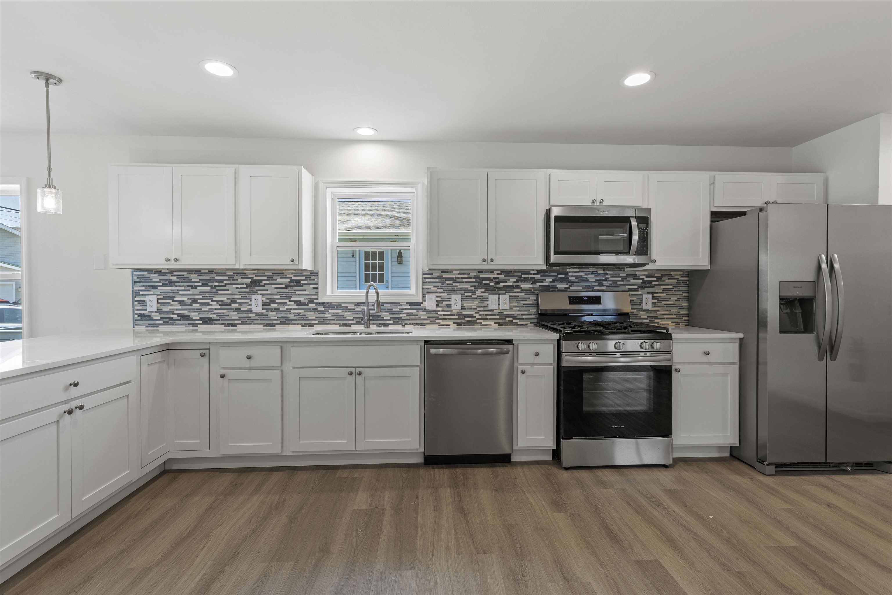 108 Sunray Road Del Haven, NJ 08251 - Photo 6 of 36 a kitchen with stainless steel appliances granite countertop a stove a sink and a refrigerator